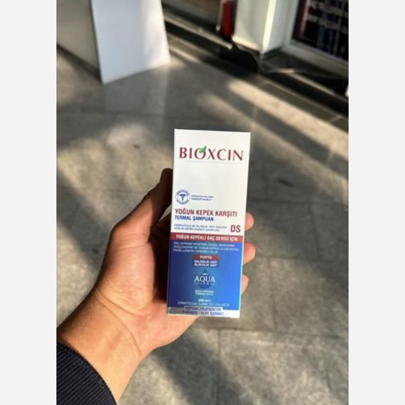 شامپو ضد شوره و بدون سولفات  بیوکسین مدل آکوا حجم 200 میل BIOXCIN 