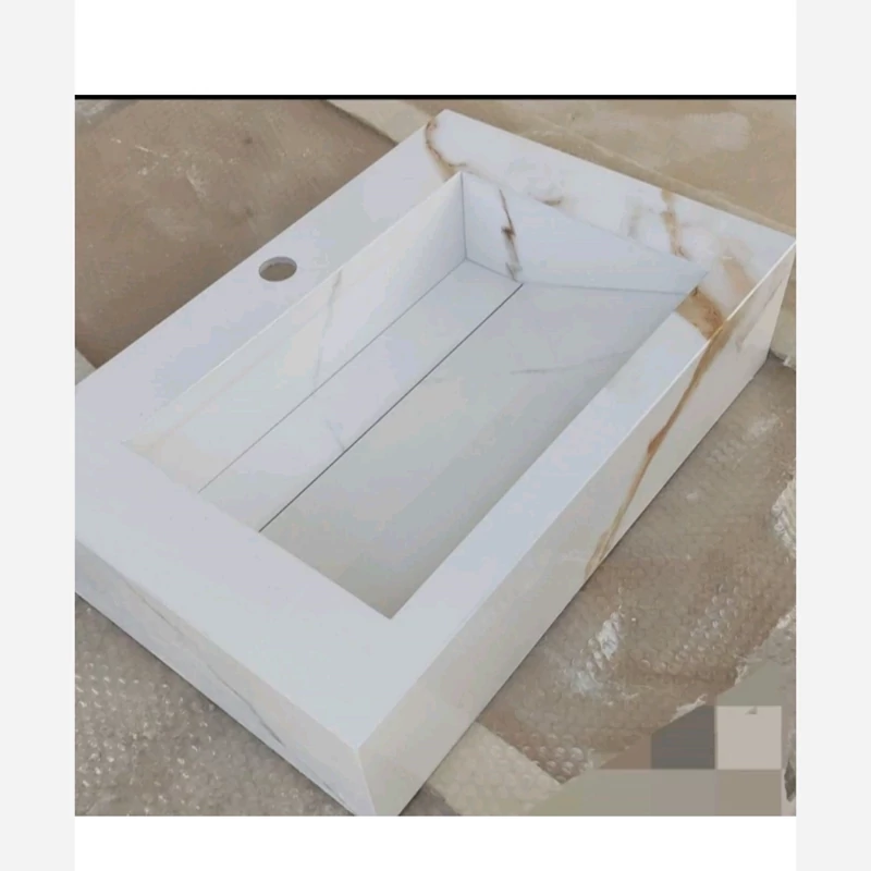 روشویی سرامیکی پرسلان سفید رگه طرح سنگی طلایی ارسال بصورت پسکرایه می باشد