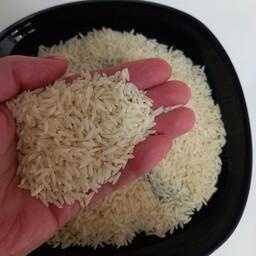 برنج ایرانی فوق اعلا درجه یک هاشمی اصل گیلان یکدست و پاک شدو تمام دانه