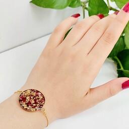 دستبند زنانه استیل،ساخته شده از گل رز وورق طلا،جنس رزین اپوکسی ضدخش رنگ ثابت