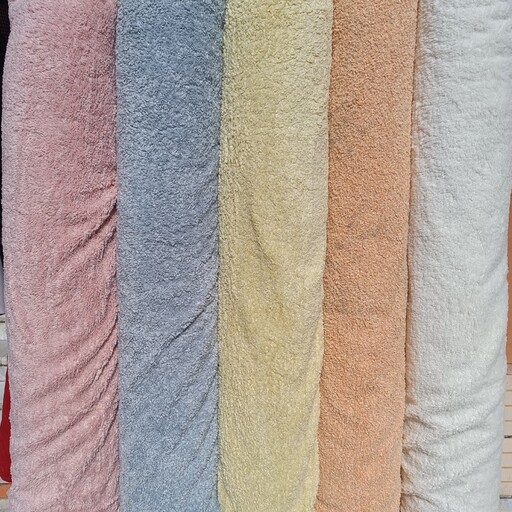 پارچه تدی ببعی لمه دار عرض 170  کیفیت درجه یک بسیار ضخیم هریک متر یک کیلو در رنگهای زیبا