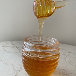 عسل طبیعی   در بسته بندی یک کیلوگرمی