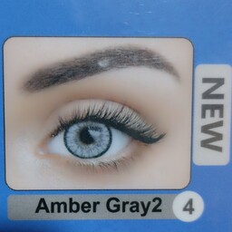 لنز چشم فصلی Amber Gray 2 جدیدترین رنگ طوسی 2سری PRO  با مجوز بهداشت و استاندارد اروپا CE  با جالنزی هدیه.لنز طبی رنگی