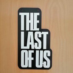 استند لوگو گیم دلست آو آس The Last Of Usجنس چوب MDF قابل دکوری و نصب روی دیوار  گیمر  گیمینگ
