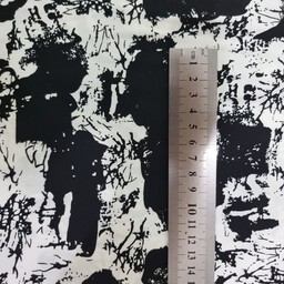 پارچه لباس مدل کودری نخی لکه سیاه  عرض یک و نیم متر (قیمت هر  یک متر) 