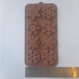 قالب شکلات و پاستیل طرح زیبای دونه برف.جنس سیلیکونی رنگ قهوه ای 