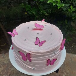کیک صورتی شارپ دار پروانه ای،فیلینگ موز  گردو و نوتلا با وزن  1 و نیم کیلو سفارشات شما با طرح مختلف قابل اجراست.