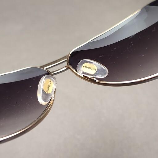 عینک آفتابی فلزی پورش دیزاین  بسیار مقاوم و دسته ها فنر سویسی..یووی 400 ..برند روی هردو عدسی حک شده ..با وضوح دید عالی 