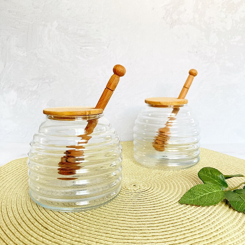 ظرف عسل شیشه ای با  درب و قاشق چوبی برند دنیز