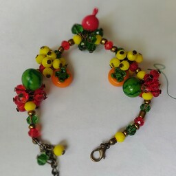 دستبند سه بعدی با میوه های یلدایی انار هندوانه و خرمالو