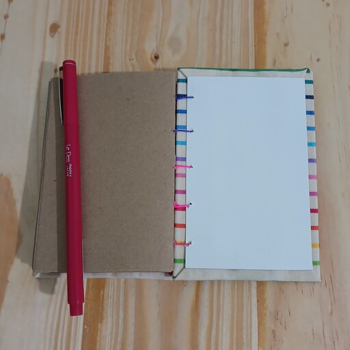 دفتر دستساز  پارچه ای راه راه رنگی، 56برگ،جنس کاغذ کرافت بدون خط 