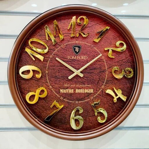 ساعت تام فورد سایز 65 جنس بدنه پلاستیک صفحه پشت ساعت چوبی شماره آبکاری برجسته موتور آرام گرد رنگ قهوه ای