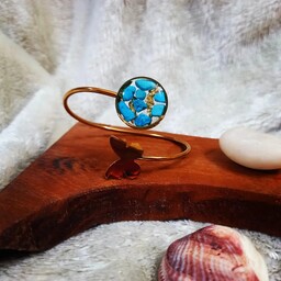 دستبند استیل پروانه دار کار شده با سنگ فیروزه و ورق طلا 