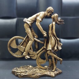 مجسمه دکوری دختر و پسر دوچرخه سوار