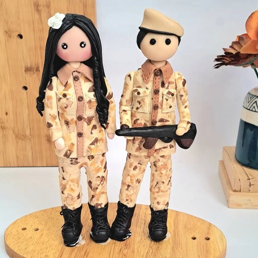 مجموعه دو عددی عروسک مجسمه پسر و دختر سرباز 