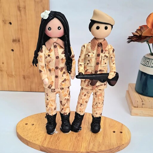 مجموعه دو عددی عروسک مجسمه پسر و دختر سرباز 