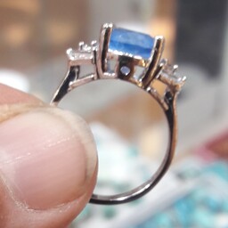 انگشتر نقره زنانه رادیوم کاری همراه با جواهر بسیار زیبا و چشم نواز توپاز سوئیسی