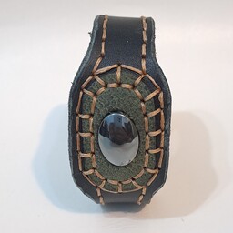 دستبند چرم طبیعی  زنانه و مردانه مشکی رنگ ترکیب شده با سنگ حدید