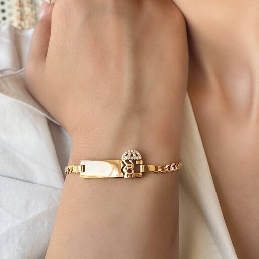 دستبند ژوپینگ زنجیر کارتیر تخت با پلاک طلایی براق ساده