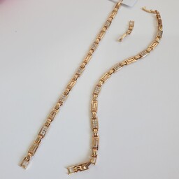 دستبند ژوپینگ طرح طلا مدل ورساچه با قفل اضافه سایزر ابکاری طلا رنگ ثابت خیلی شیک بدلیجات کرمانجی