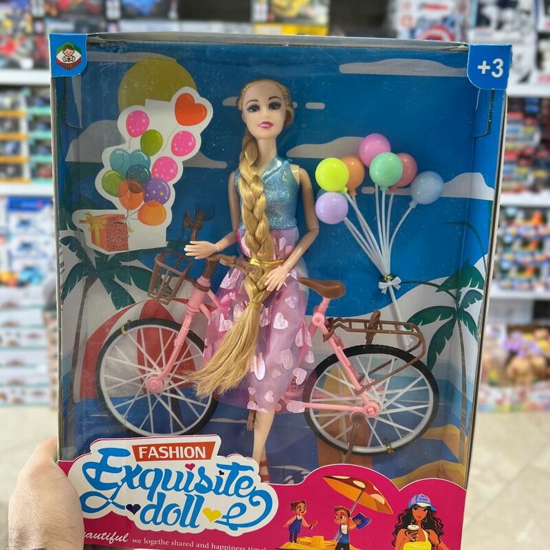 عروسک باربی با دوچرخه و بادکنک