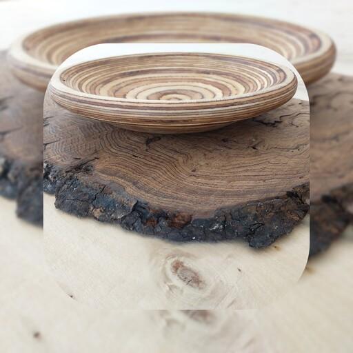 شیرینی خوری چوبی دایره ای شکل به صورت حجم تراشی شده ساخته شده از دو لایه پلای وود