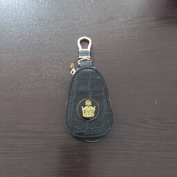 جاسوئیچی روکش طلا چرم با نماد ورق طلا همراه با شناسنامه و جعبه ارجینال