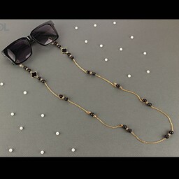 بند عینک رنگ ثابت با سنگ مشکی وطلایی همراه زنجیره رنگ ثابت 