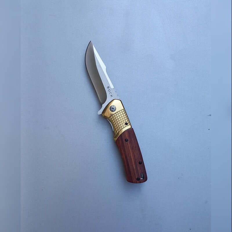 چاقو تاشو نیمه اتومات باک طلایی مناسب کوهنوردی و سفر 