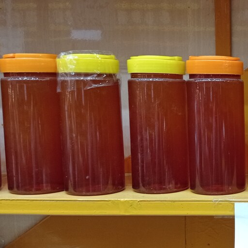 عسل گشنیز طبیعی دارای سیب سلامت امساله 1 کیلویی