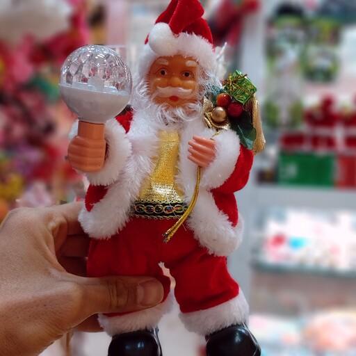 عروسک بابانوئل رقاص مشعل دار 