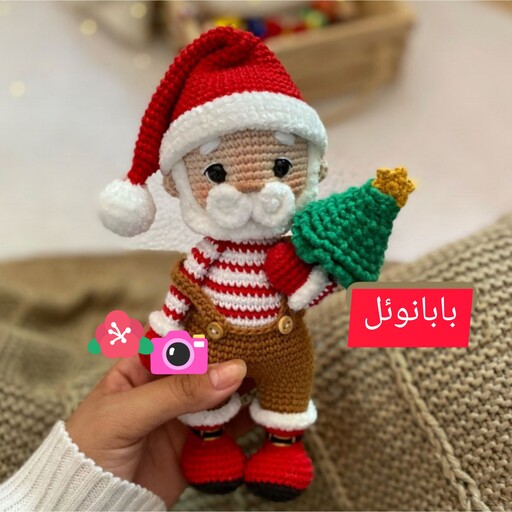 عروسک بافتنی بابانوئل بافته شده با کاموای ایرانی 