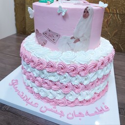 کیک جشن تکلیف دوطبقه سفید و صورتی با تاپر فرشته ( 7 کیلو) هزینه ارسال با مشتری