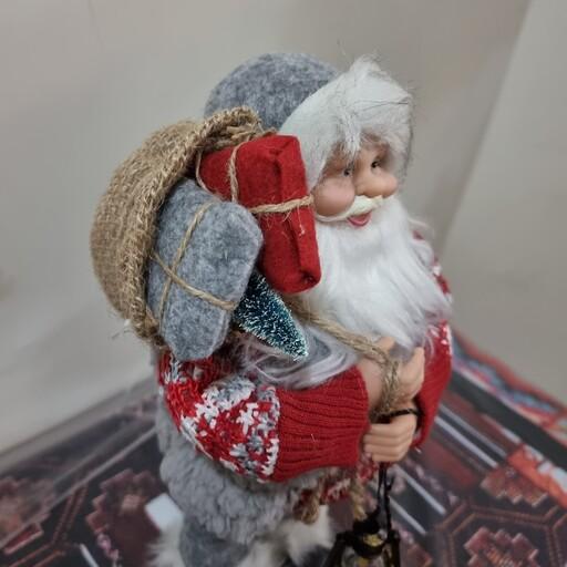 عروسک بابانوئل متوسط مدل فانوس و گیفت