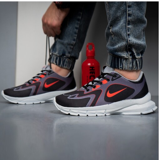 کفش ورزشی مشکی قرمز مردانه Nike مدل Bevis