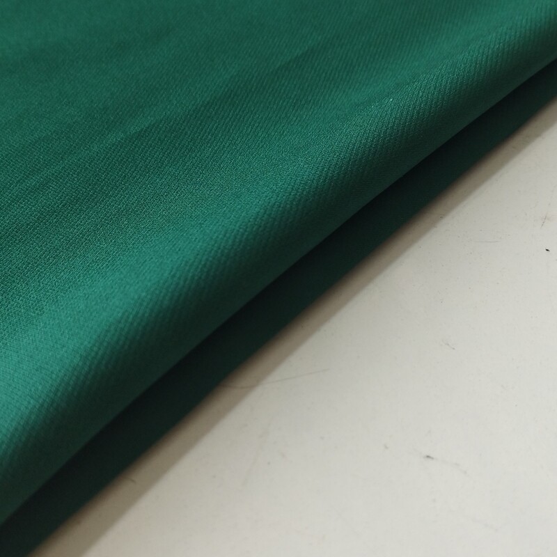 پارچه مازراتی درجه یک رنگ سبز تیره قیمت به ازای ده سانتی متر می باشد