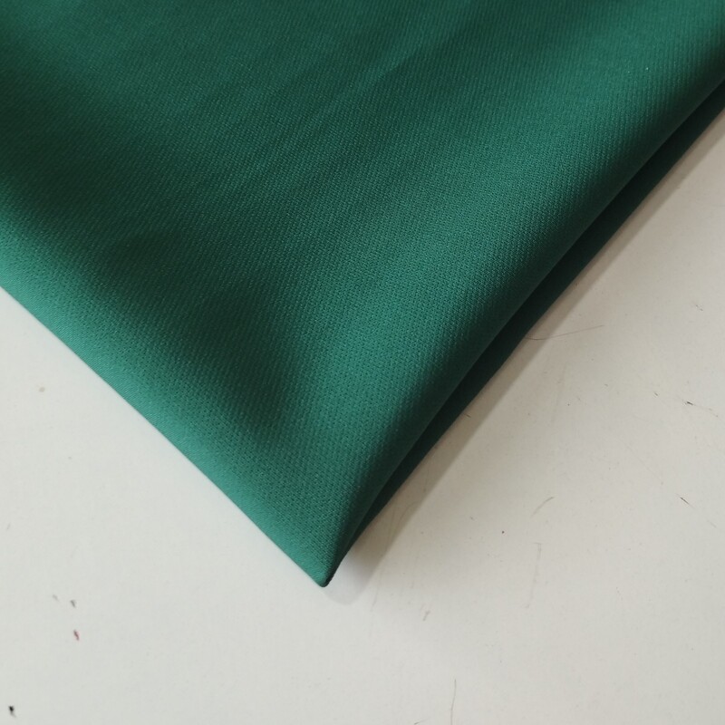 پارچه مازراتی درجه یک رنگ سبز تیره قیمت به ازای ده سانتی متر می باشد