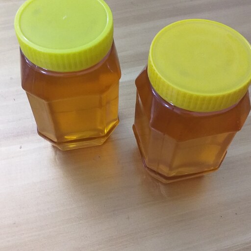 عسل صددرصد طبیعی زنده( دربسته های 1000گرمی  خالص) 