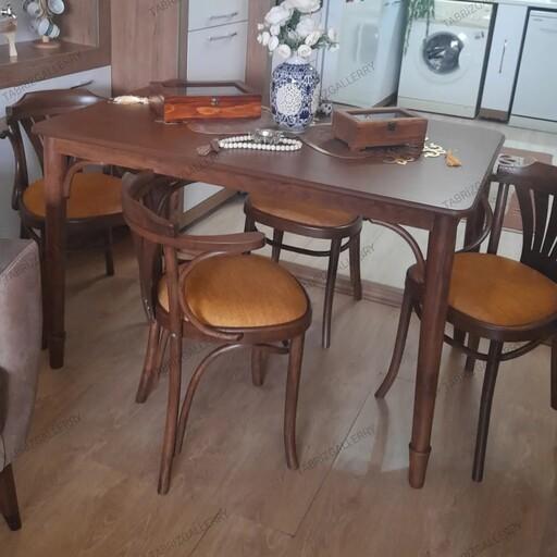 ست ناهارخوری چهار نفره لهستانی شامل صندلی و میز  با صفحه چوبی 