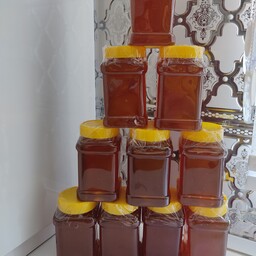 عسل بهاره شیره عسل ده کیلو ظرف های یک کیلویی عسل صاف شده