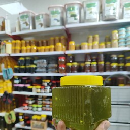 عسل سبز زیتون وحشی ارسال رایگان فروش عمده کیلویی 180  در دبه ی 22 کیلویی