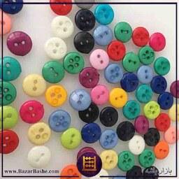 دکمه لباس پلاستیکی رنگی سایز یک سانتی متر بسته 100 عددی