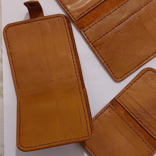 کیف پول جیبی مردانه تهیه شده با چرم طبیعی گاوی تمام دستدوز