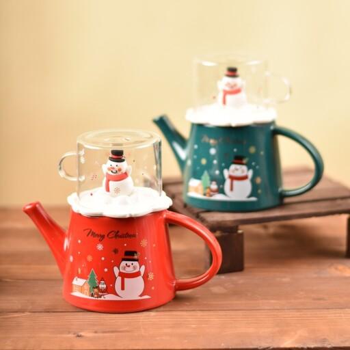 قوری و لیوان طرح  کریسمسی با صافی چای گنجایش حدودا 400  سی سی کار بشدت با کیفیت دو رنگ سبز  و قرمز  آدم برفی