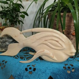 مجسمه ماهی چوبی