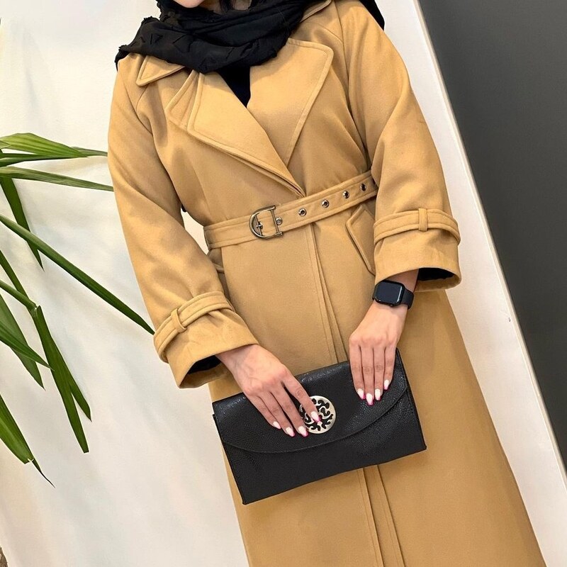 پالتو زنانه بلند فوتر کوبیده باکیفیت سایز36تا60 رنگبندی مشکی شتری نسکافه ای با ارسال رایگان 