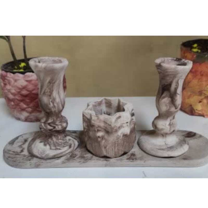 ست جا شمعی سنگ مصنوعی شامل دو جا شمعی پایه دار ،یک گلدان مینیاتوری و یک سینی بیضی شکل