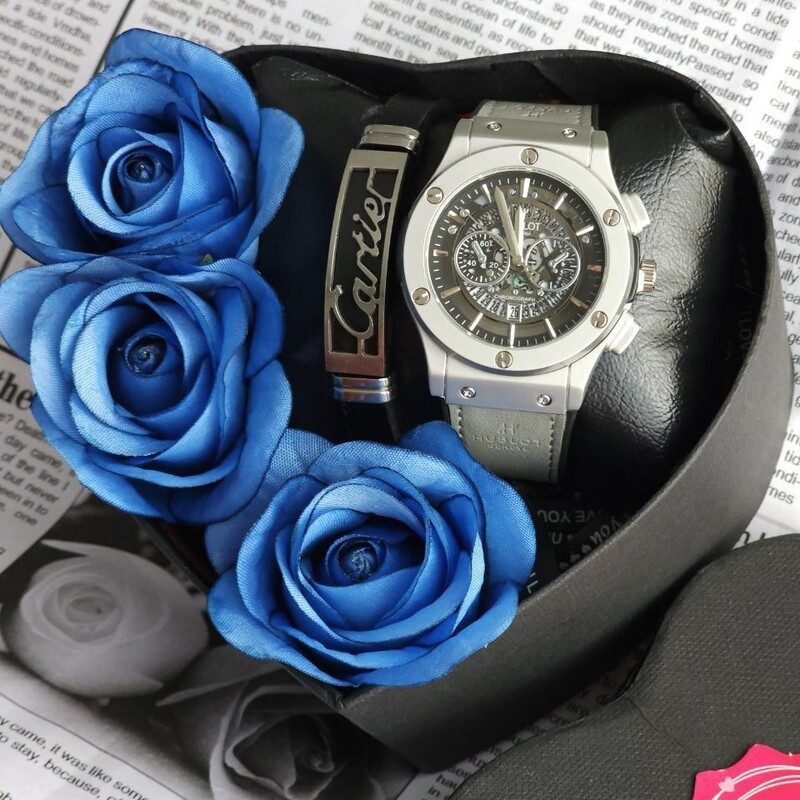 باکس هدیه مردانه
ساعت هابلوت 
طرح سه موتوره 
دارای روزشمار 
بهمراه یک عدد دستبند 
و باکس هدیه و گل