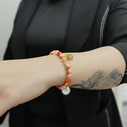 دستبند زنانه و دخترانه تمام سنگ عقیق نارنجی با نشان جغد طلایی