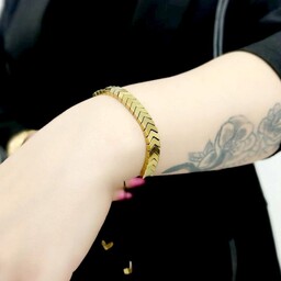 دستبند زنانه و دخترانه سنگ حدید فلشی طلایی